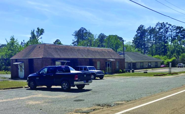 LEAKING ROOFS - The Cleveland County Cooperative Extension Office (left) and the Cleveland County Health Unit (right) are two of three countyowned buildings that are currently having problems with leaking roofs. The Extension Office and Health Unit are located next to one another on Magnolia Street in Rison. The county jail, located in the county courthouse complex, is having the same issue as well.