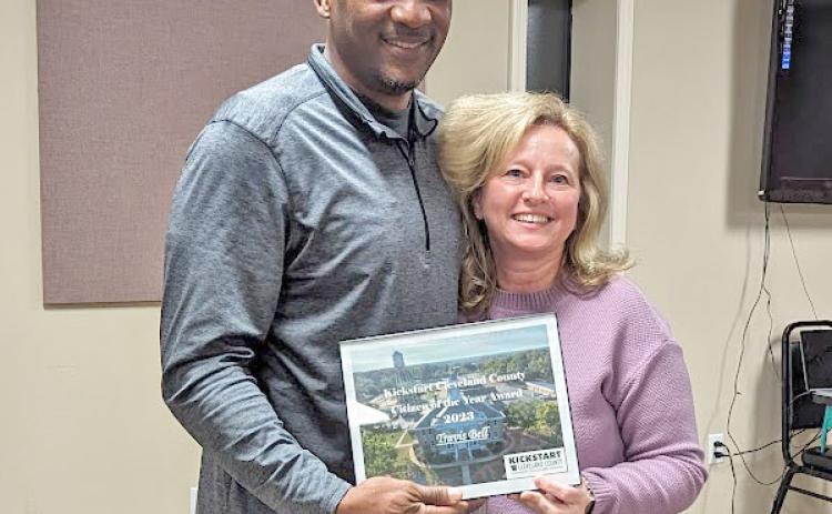 TRAVIS BELL CITIZEN OF THE YEAR - Kickstart Cleveland County President Stacy Walz (right) presents Travis Bell (left) of Rison with the first-ever Kickstart Cleveland County Citizen of the Year Award.
