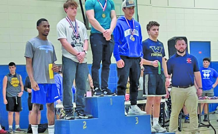 RAULS, MOORE TOP TWO AT STATE MEET - Woodlawn’s Jude Rauls (center) and Aiden Moore (second from center) fiinished first and second, respectively, in the 148-pound class at the Arkansas High School Powerlifting State Meeting held Saturday at Monticello. Rauls set three new state records in winning the 148 state title while Moore tied or set new personal bests to finish second. (Photo courtesy of Colby Rauls)