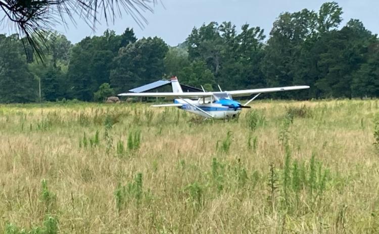 EMERGENCY LANDING BETWEEN RISON AND CALMERR - This single-engin e airplane was forced to make an emergency landing in Lunsford's cow pasture after running out of fuel on a flight from Houston to Pine Bluff last Thursday evening, according to the Cleveland County Sheriff's Department. The pilot nor his passenger were injured, and the sheriff's department there was no damage to the plane.