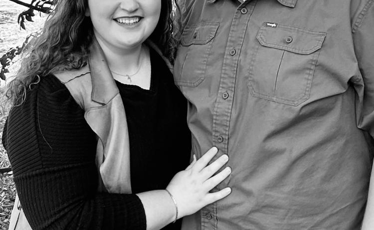 Holly Cummings and Harrison Reed
