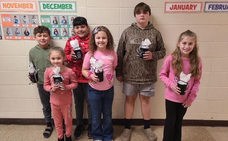 WES JANUARY STUDENTS OF THE MONTH - These Woodlawn Elementary students were nominated by their homeroom teachers for exhibiting good behavior and kindness throughout the month of January. Pictured left to right are: Grant Rushing (3rd Grade), Dalezya Pineda (1st Grade), Davis Huitt (5th Grade), Grace McDaniel (2nd Grade), Wyatt Parker (6th Grade), Hadley Smith (4th Grade). Not Pictured: Hudson Lavender (Kindergarten).