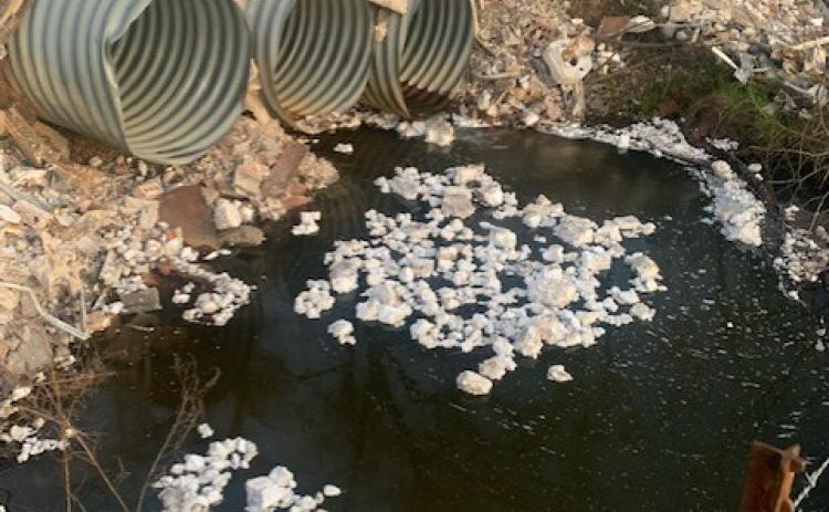 STYROFOAM PROMPTS COMPLAINTT - This photo submitted by Robin Peddy of the Herbine community shows the styrofoam from the rip-rap placed along Lonesome Dove Road that ended up in the creek. In addition, she said it has parts of bathroom fixtures and large pieces of metal in it as well. County Judge Jimmy Cummings said the county road departme nt will no longer use the rip-rap from the old nursing home demolition.
