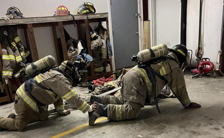FIRE DEPARTMENT TRAINING - The Rison Fire Department is pictured conducting entry training to help keep firefighters safe when entering a structure fire. Assistant Fire Chief Bruce Grubb and Firefighter Keden Shrum detail some of the training and needs of the department on this week’s episode of the Free Range Conversations podcast. (Photo courtesy Rison Fire Department)