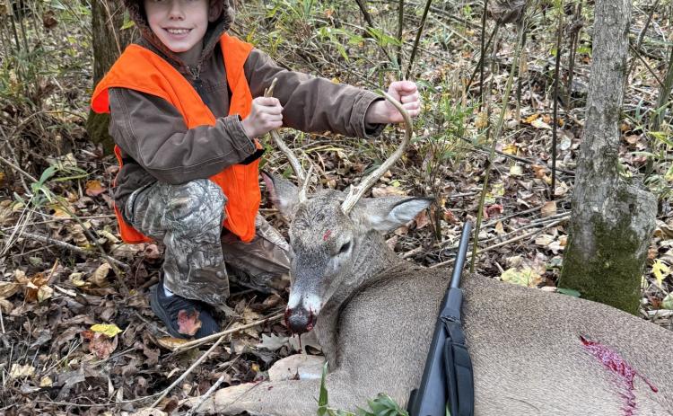 FIRST DEER - Jackson Neal, 8 years old, killed his first deer, a 6-point, in Kingsland.