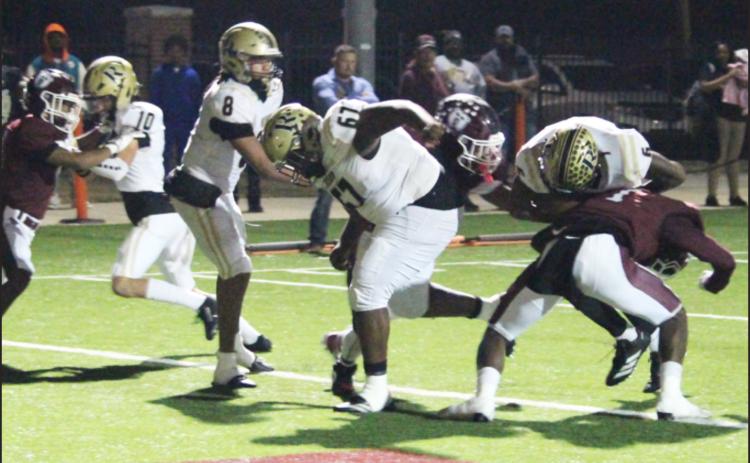 PUNCHING THROUGH - Rison running back Jaquis Rauls (right, 6) follows the block of T.J. Marks (67) to cross over the goal line and help put the Wildcats back on top of the Barton Bears, 22-20, in second quarter on Friday night’s season finale at Barton. Rauls, a senior, rushed for 68 yards and scored two touchdowns in what was his final football game for Rison. Also pictured for the Wildczts are Henry Garner (10) and Kyson Fletcher (8). (Photo by Chris Phillips)