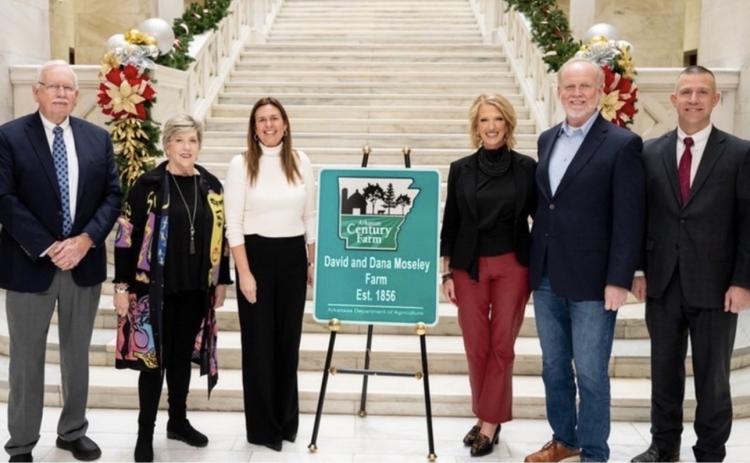 MOSELEY FARM INDUCTED INTO ARKANSAS CENTURY FARM PROGRAM - (Left to right) David Moseley, Dana Moseley, Gov. Sarah Huckabee Sanders, Alana Moseley Graham, Fred Taylor Graham, and Arkansas Secretary of Agriculture Wes Ward at the recent 2025 Arkansas Century Farm Induction Ceremony.