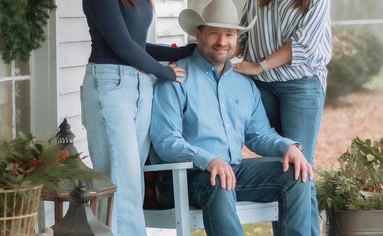Keden Shrum (center) with daughter Ragan (left)  and wife Chandra (right)