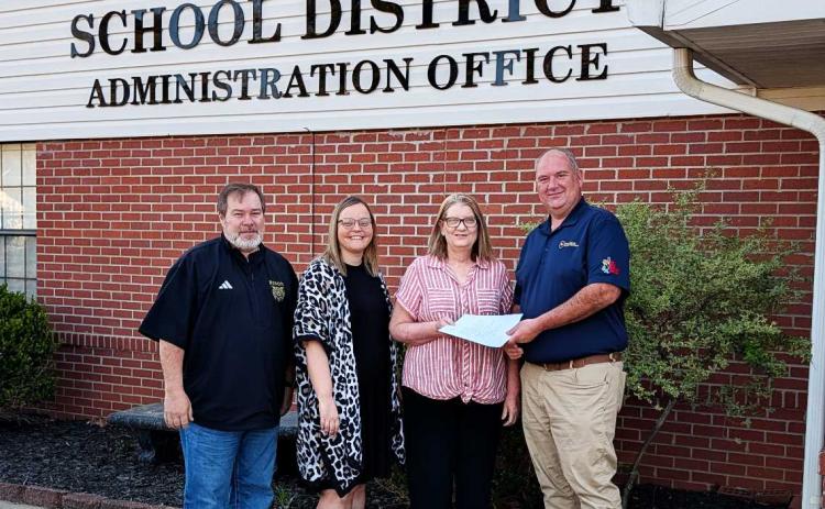 HEAD START RECEIVES DONATION OF LAND FROM INTERNATIONAL POULTRY - Cleveland County School District’s Head Start program received a donation of a 0.87-acre lot from International Poultry Breeders. Pictured left to right are CCSD Superintendent Davy King, Head Start Director Laura Stanfield, Head Start Facilities/Nutrition and Safety/Transportation Manager Connie Keese, and IPB Arkansas General Manager Jamie Phillips.