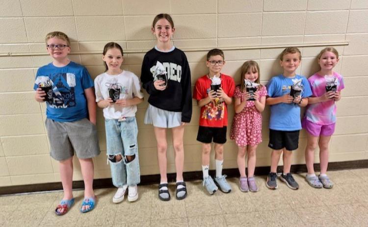 Left to Right: Jackson Bearden (4th grade), Sadie Gavin (5th grade), Clara Kennedy (6th grade), Carson Edmondson (2nd grade), Blakley Jones (1st grade), Ryan Young (Kindergarten), Marlee Jacks (3rd grade).