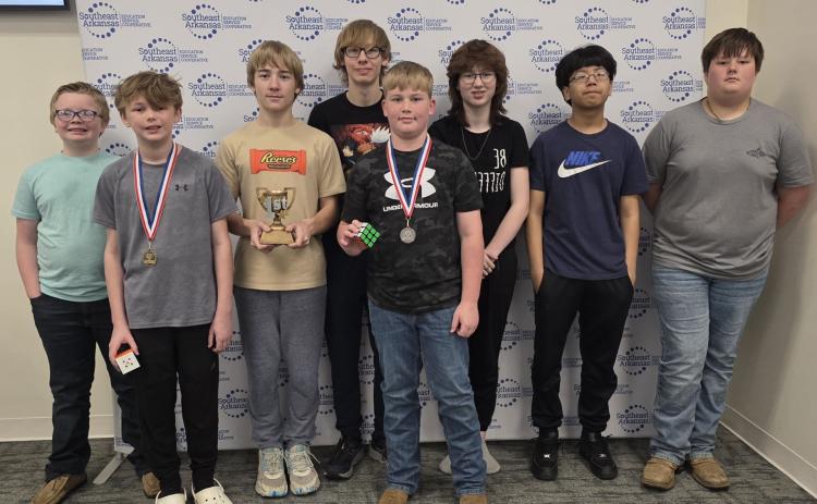 Pictured are (left to right) Jackson Bearden, Jack Harris, Justus Lowe, Isaac Lowe, Brantley Reed, Shelby Nooner, Victor Hu, and River Barrett. (Photo courtesy of Misty Davis, Woodlawn School District)