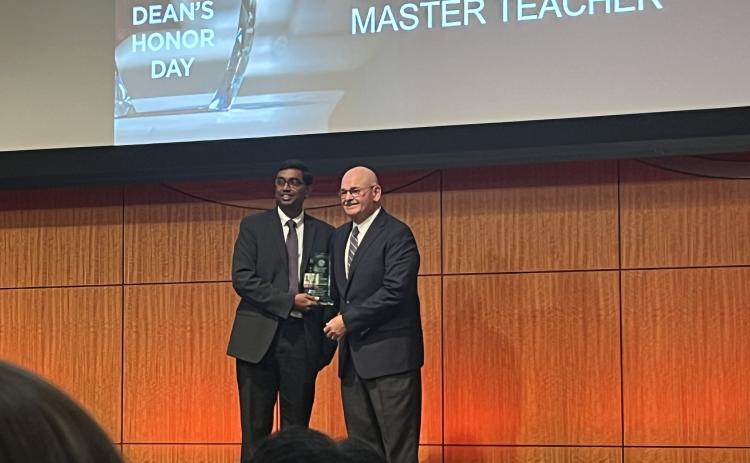 Dr. Kraleti presents the UAMS 2026 Master Teacher Award  to Dr. Mark Attwood of Rison