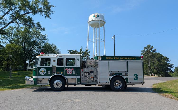 The green truck now adorns the Rison emblem matching the water tower.