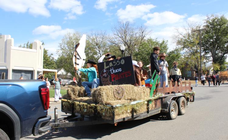 The eighth graders won the junior high contest with their rodeo themed float.