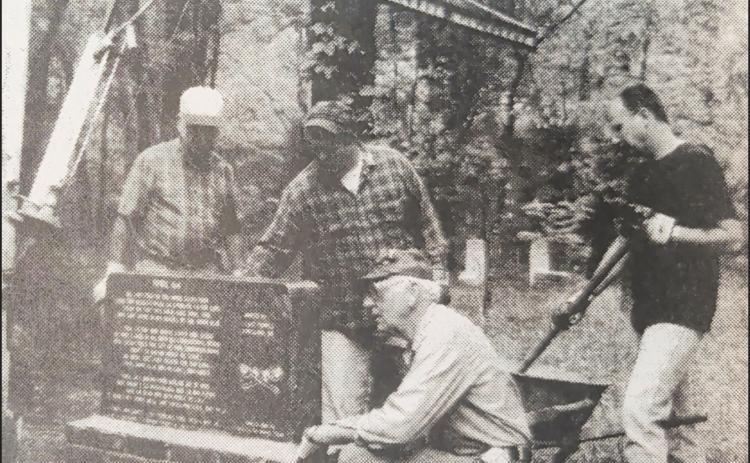 GLIMPSES  FROM  THE  PAST - In this 2004 photo, a new granite marker was placed near the graves of unknown Confederate soldiers at Marks’ Mill Cemetery in New Edinburg. Pictured left to right are Jimmy Boney, Tim Reaves, Edgar Colvin and Scott Temple. Temple wrote the poem that is etched on the stone.