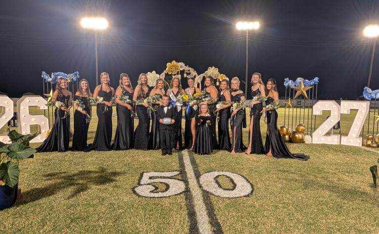 Pictured left to right are Alivia Nixon, Riley Swan, Brinley Allred, Zoey Hunter, Brynne Stover, Anna Brown, Leah Brewer, Sadie Hall, Ella Wooden, Anslee Aud, Erin Vinson, Emily Reed, Emerlynn Stratton. Mascots in front are Ridge Jones and Emerson Ashcraft.