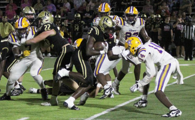 BIG NIGHT FOR WALKER - Rison senior Kyson Walker (3) follows the block of Aidan Bitely (22) as he takes on Dumas defender during first half action of the Wildcats’ wild 65-42 win over the Bobcats Friday night. Walker rushed for 209 yards on 22 carries with seven touchdowns.