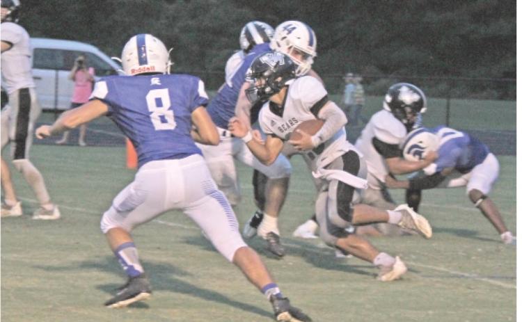 BIG NIGHT FOR CALEB MARTIN ■ Woodlawn senior running back Caleb Martin (center, with ball), seen here in the Bears' first game with Parkers Chapel on Sept. 2, scored four touchdowns in the re-match with the Trojans last Friday night at the Carl Jones Sports Complex. In addition to scoring on runs of one, 31 and 32 yards, Marlin also had a 75 kickoff return for a touchdown. He finished wit 74 yards rushing on just four carries to average 18.5 yards per attempt.