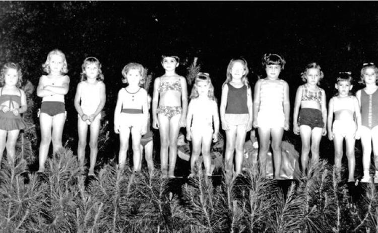 GLIMPSES FROM THE PAST - Our final county fair glimpse from t he past this week features contestants from the 1967 'Little Miss Cleveland County' pageant. The girls are, left to right on stage, Pamela Joy McKinney, Sandy Martindale, Merri Mercer, Marla Machelle Rogers, second runner-up, Donna Ellison, Renee Knowles, first runner-up, Sheila Rawls, Patricia Patrick, Brenda Brown, Kimberly Ashcraft, and Lori Ann Hankins, queen. For questions or comments, contact Stan Sadler at sadler.stan@yahoo.com