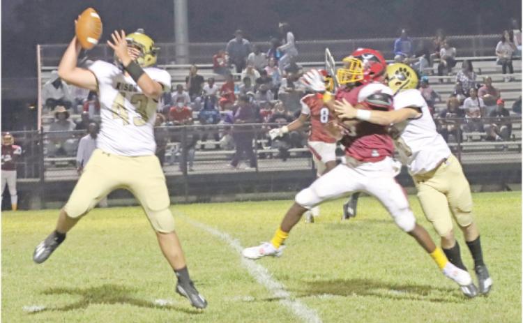 WILSON ON THE PICK - Rison sophomore linebacker Thomas Wilson (left, no. 43) steps in front of Dollarway s Sha marión Winslon for one of three interceptions durirtg last Friday's 6-3A conference opener at Pine Bluff. Also on frie play for Rison is junior defensive back James Mitchell (right, no. 6), (Photo by Chris Phillips)