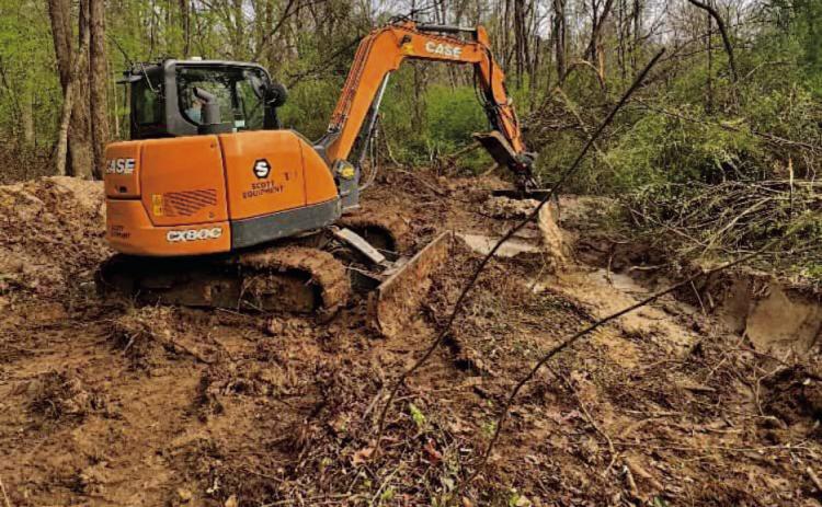 BROKEN WATER MAIN - Rison Mayor Charles Roberts said the treacherous conditions to get to the six-inch water main leak forced the city to bring in a larger excavator to repair the leak. This scene shows the wooded area where the leak was located. (Photo courtesy of City of Rison)