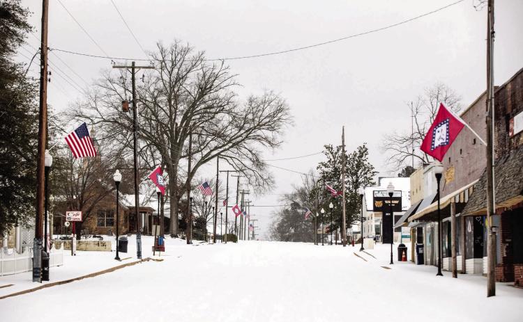 QUIET ON MAIN STREET - Main Street in Downtown Rison was a picture-perfect scene Saturday under blankets of ice and snow from the weekend's winter storm. (Photo courtesy of Michelle Roberts Photography)