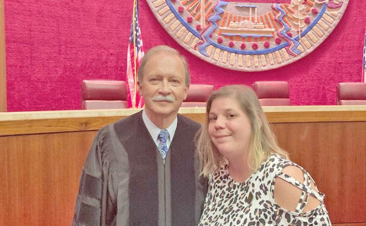 HERRING RECEIVES NATIONAL CERTIFICATION - Arkansas State Supreme Court Chief Justice John Dan Kemp (left) recently presented Cleveland County Deputy Circuit Brandy Herring (right) with her Certified Court Management certification after completing the three-year training course. The presentation was made last month in the chambers of the Arkansas Supreme Court in Little Rock. (Photo courtesy of Jimmy Cummings)
