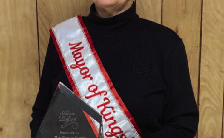 LAST MEETING - Mayor Sharon Crosby with a plaque presented to her during her last Kingsland City Council meeting on Dec. 20.