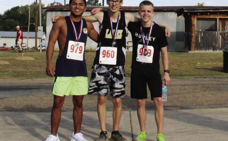 FALL INTO FITNESS 5K UNDER 28 MALE WINNERS - The top finishers i n the Under 28 Male Division at the Fall Into Fitness 5K at Rison in the Fall Saturday morning were (left to right) first, Kaleb Romero (19:50); second, Isaac Rowe (19:52); and third, Dakota Sullivan (23:02).