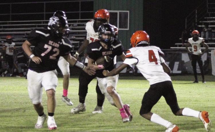 BIG NIGHT FOR THE RUN GAME - Woodlawn fullback Ace Culliford (72) moves out to set a block for running back Griffin Manes (1) during the Bears 76-56 win over Dermott Friday night at the Carl Jones Sports Complex. Manes rushed for 219 yards and scored four touchdowns while Culliford had 39 yards and two touchdowns. Woodlawn rushed for 466 yards on the night.