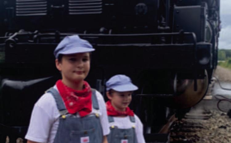 YOUNG ENGINEERS - Ethan and El.ah Coston traveled from Hot Springs to Kingsland with their grandmother to see the Big Boy Train.