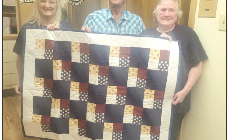 Pictured are Treill Meeks, Sheriff Jack Rodgers and Barbara Cox.