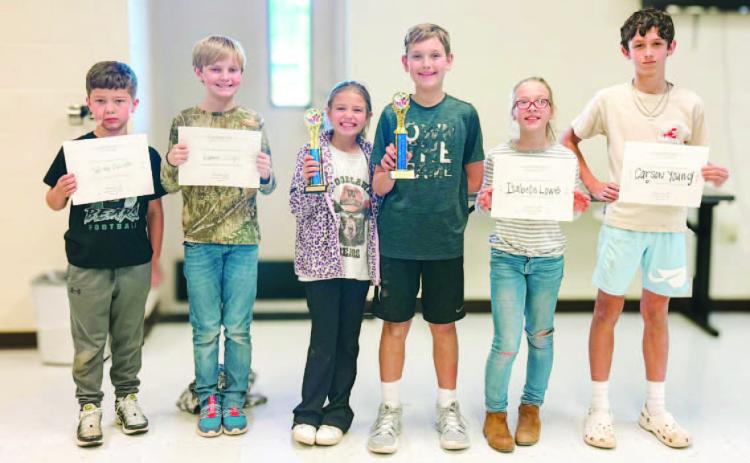 The winners of third through fourth grade: Champion: Emma Brock, Runners up: Kannon Ziegler and Wesley Meredith. The winners of fifth through sixth grade: Champion: Luke Roberts, Runners up: Isabelle Lowe and Carson Young.