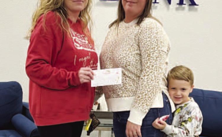 3rd Place Float - County Clerk Celeste Beatty presents prize to Brandy Herring