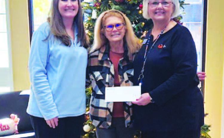 Amber Hipp and Penny Pitchford at FBT Bank with Karen Bell Fox