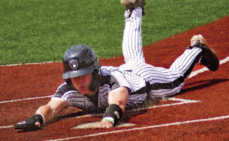 BIG TOURNAMENT FOR BRAYDEN JONES - Woodlawn junior shortstop Brayden Jones slides into home for one of two runs he scored Saturday afternoon in the Bears' 10-0 win over Center Ridge in the Class 2A semifinal game at Greenland High School. Jones was a spark plug for Woodlawn throughout the Class 2A State Tournament, going 5-for-9 at the plate over the three games with seven RBIs. His grand slam homerun in the second inning against Mansfield turned the game into a rout. (Photo by Kelvin Scott)