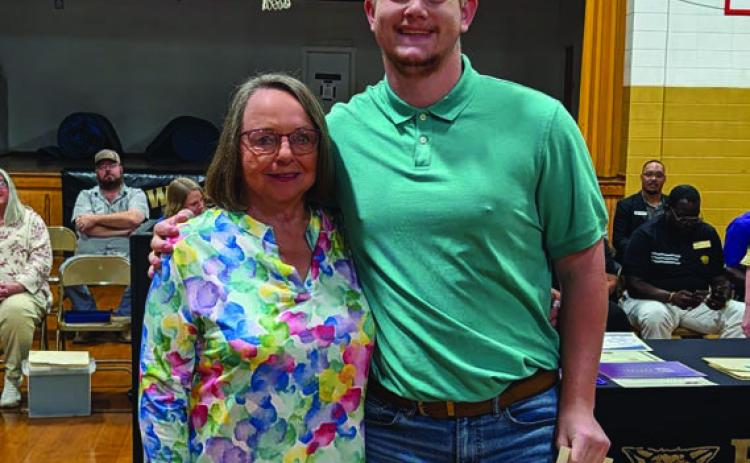 Pat Boyd presents the George Boyd Memorial Scholarship to Bryce Phillips