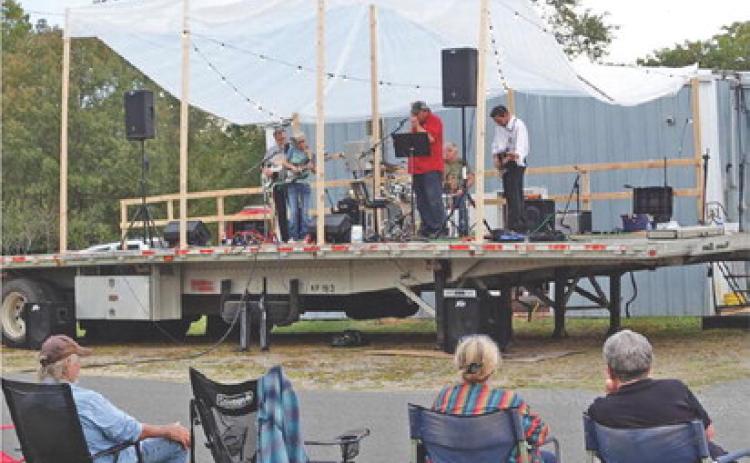Despite threatening weather throughout the day Saturday afternoon, Kickstart Kingsland’s Johnny &amp; June’s Chili Supper and Music Event still managed to bring in a good crowd. Those attending were treated to free concerts by regional bands throughout the day, and were able to take in a chili supper held inside Kingsland City Hall. This was the second year for the event.