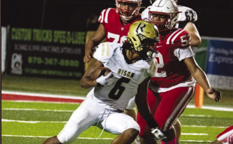 BIG NIGHT FOR RAULS - Rison running back !aAuis Rauls turneS in one o&amp; Mis best overall e&amp;&amp;orts o&amp; tMe season FriSay nigMt by rusMing &amp;or 163 yarSs on 23 carries wMile scoring a team-MigM tMree toucMSowns anS tMree two-point conversions. WilScat CoacM CMris Vereen noteS tMat Rauls sMoweS great leaSersMip in tMe practices Suring tMe week leaSing up to tMe come-&amp;rombeMinS victory over Drew Central. (PMoto by !e&amp;&amp; Young)